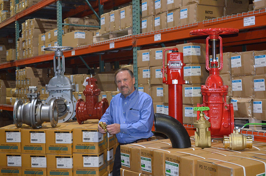 Dov, co-founder of Matco Norca, in the a warehouse with SVF products